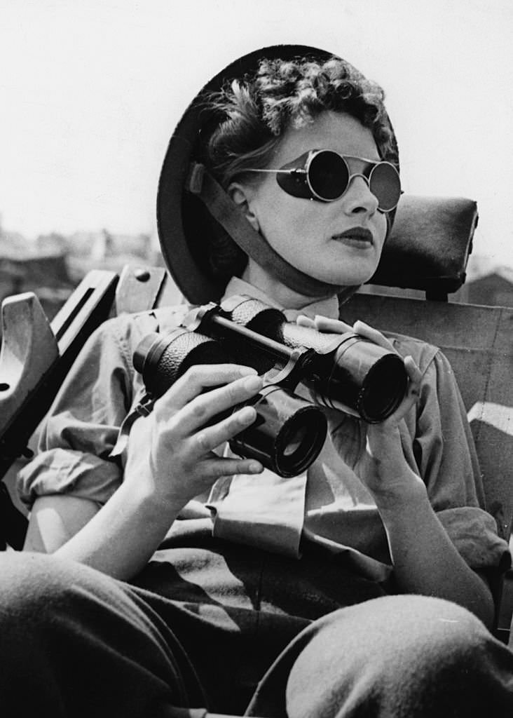 #42 Miss Parker, a member of the Auxiliary Territorial Service, on duty as an enemy aircraft spotter near London, 1943.