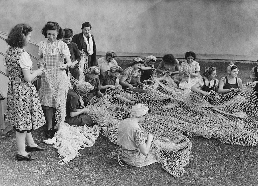 #92 Women Mending Fishing Nets, 1943