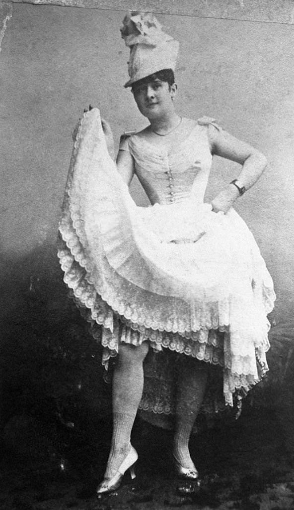#104 A dancer of the “can-can” at the old days at the old Bal Tabarin in Paris, 1900