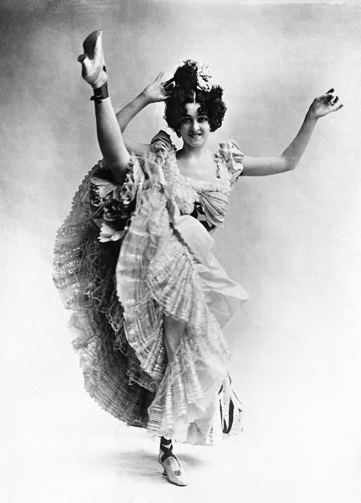 #108 The cancan dancer Saharet kicks her leg into the air, 1900s