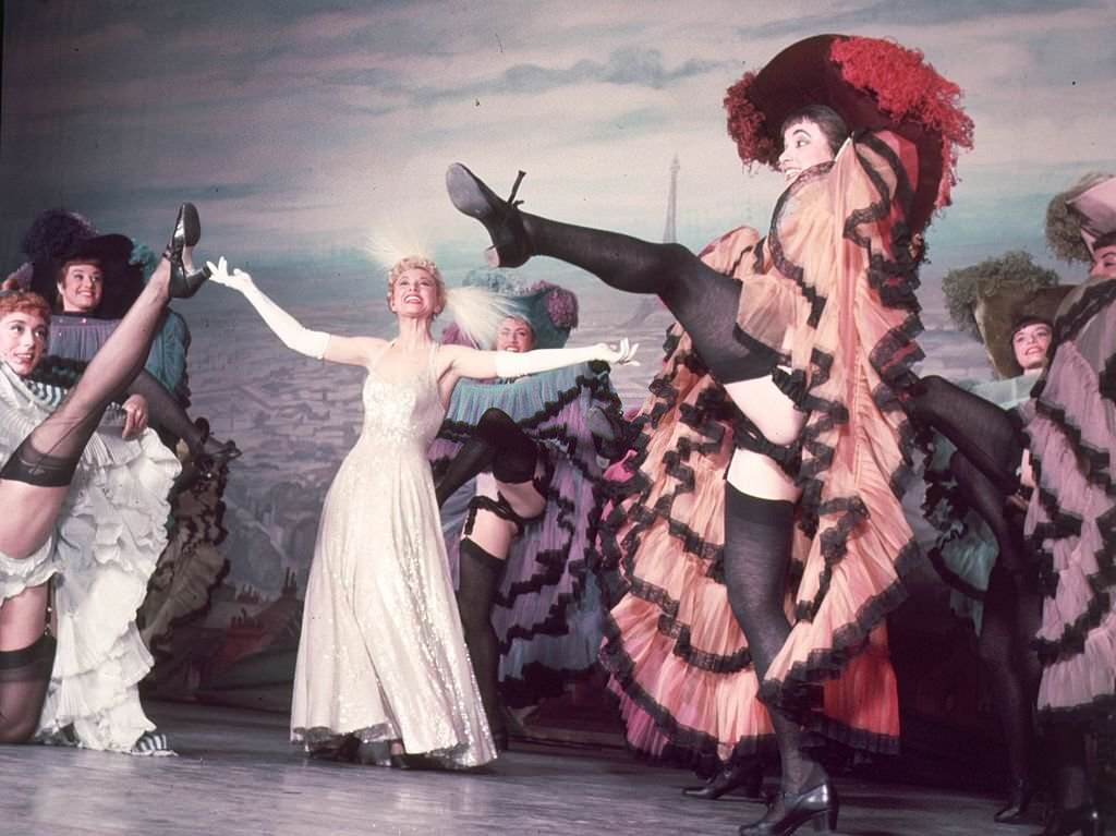 #55 Can-Can dancers performing in a Cole Porter show at the Coliseum in London, 1954.