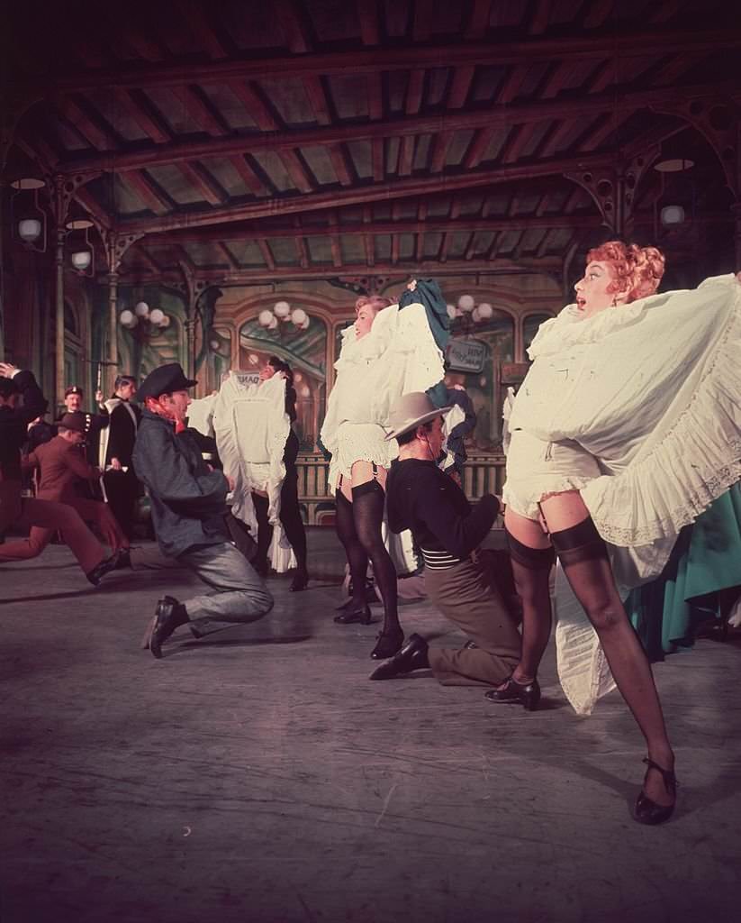 #56 Can-Can dancers performing in a Cole Porter show at the Coliseum in London, 1954.