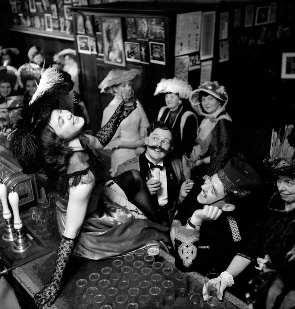 #65 Can-Can dancers cavorting on the bar at the City Varieties Music hall at Leeds, 1953.