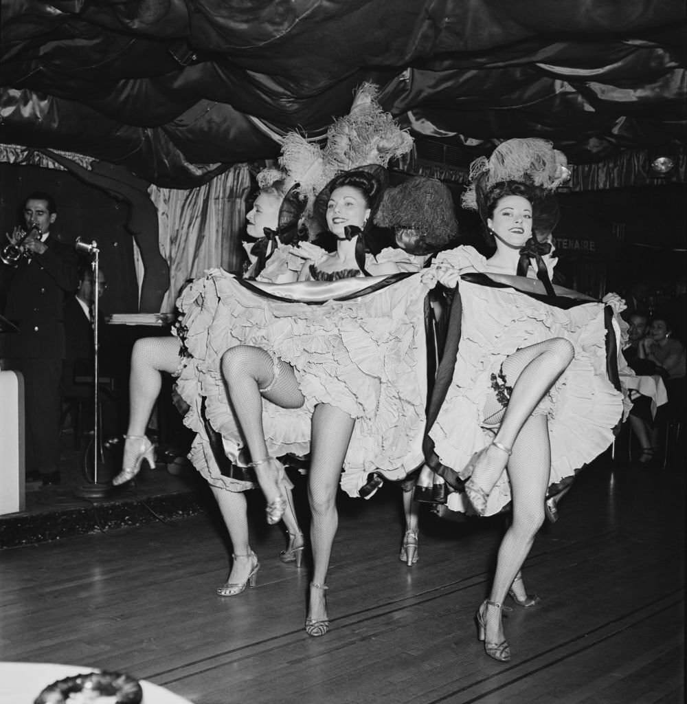 #76 Cabaret dancers at the Bal Tabarin nightclub in New York City, 1949.