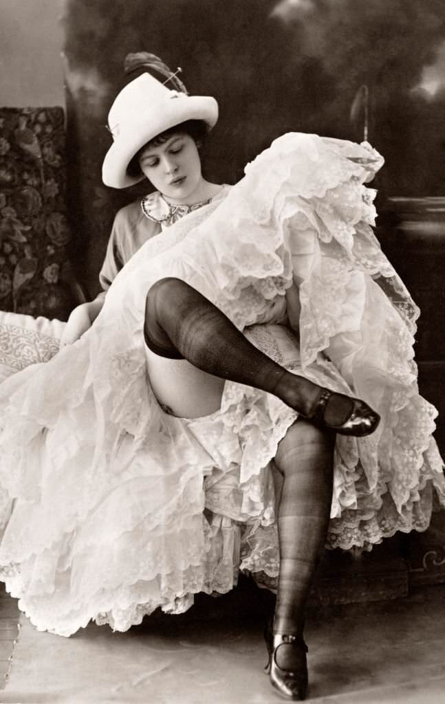 #96 A can-can dancer in repose at the Bal Tabarin, a cabaret night club in Paris, 1915.