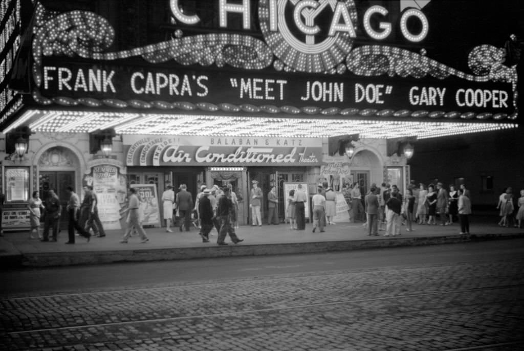 #11 Crowd and Movie Theater Marquee at Night, Chicago, July 1941