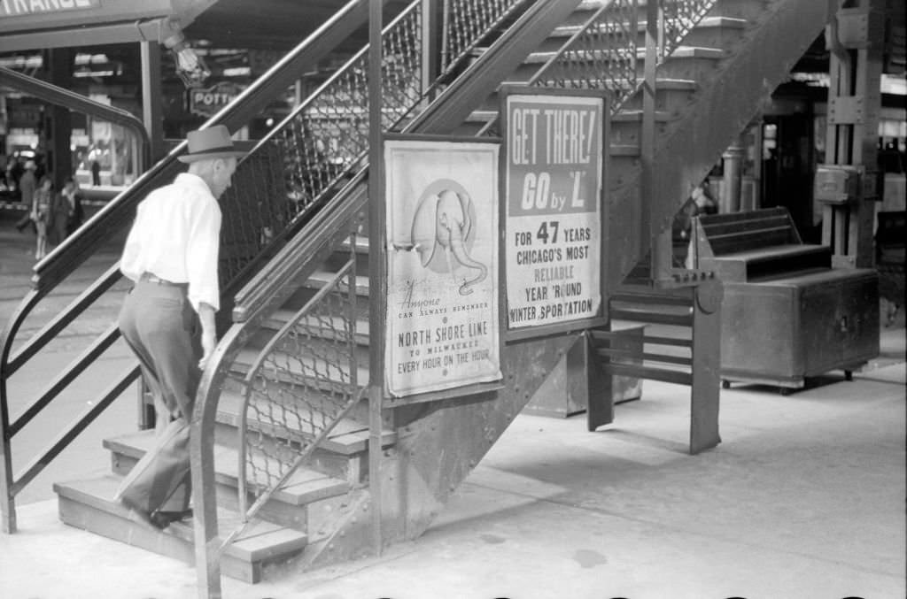#2 A man as he climbs the steps of the Chicago, July 1941