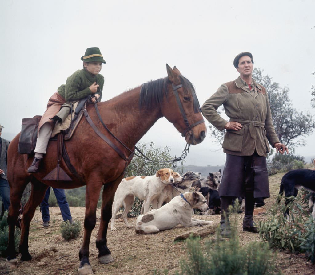 #31 Spanish bullfighter Luis Miguel Dominguin with his son Miguel in his farm of La Paz, Saelices, Cuenca, Spain, 1965.