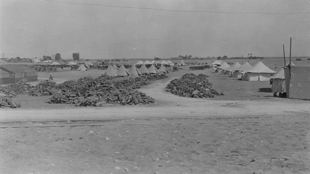 #32 General view of the Australian camp near the Pyramids. Note the electric tranway camp extension on the sand for food and equiptment transport.