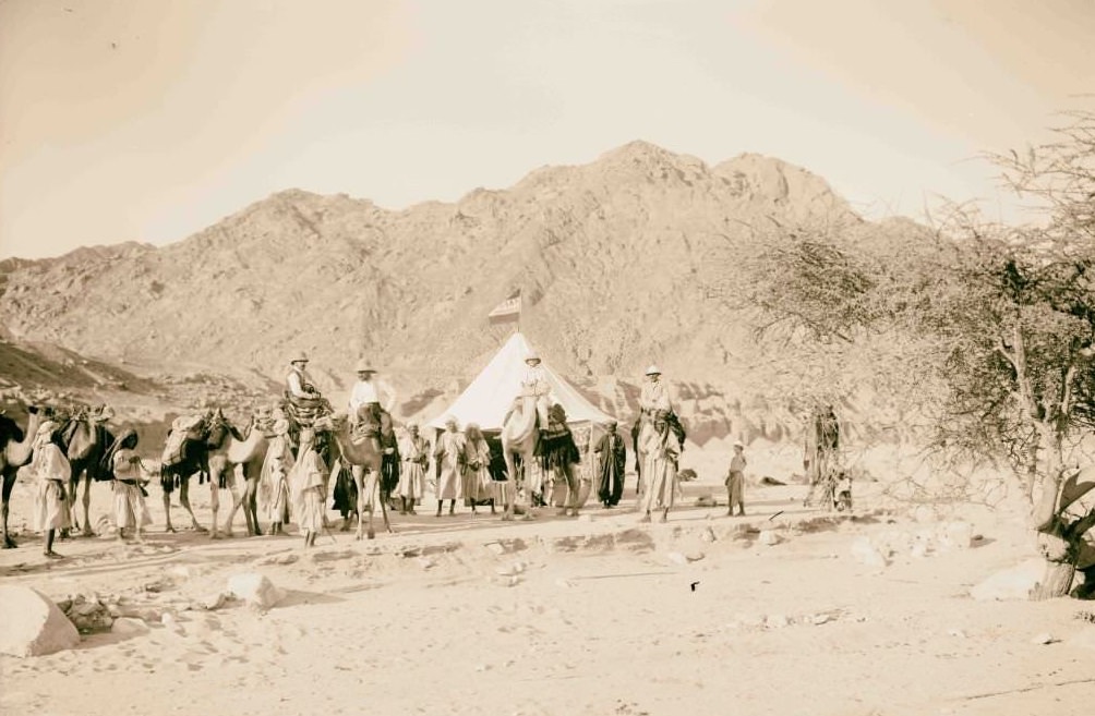 #59 Expedition camp in the Sinai, Lewis Larsson on camel directly in front of tent American Colony, Sinai, 1910