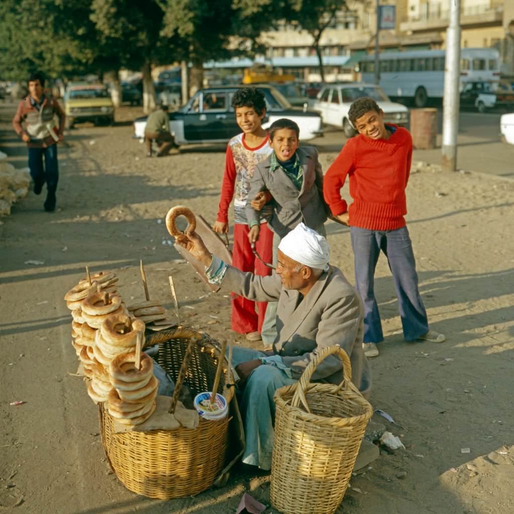 #110 A bread vendor in the streets of Cairo, Egypt, late 1970s.