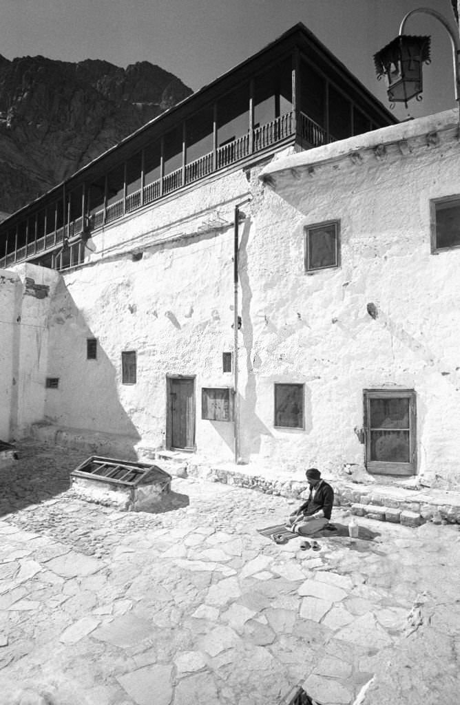 #122 A Bedouin prays in the courtyard of Saint Catherine’s Monastery in South Sinai in November 1978