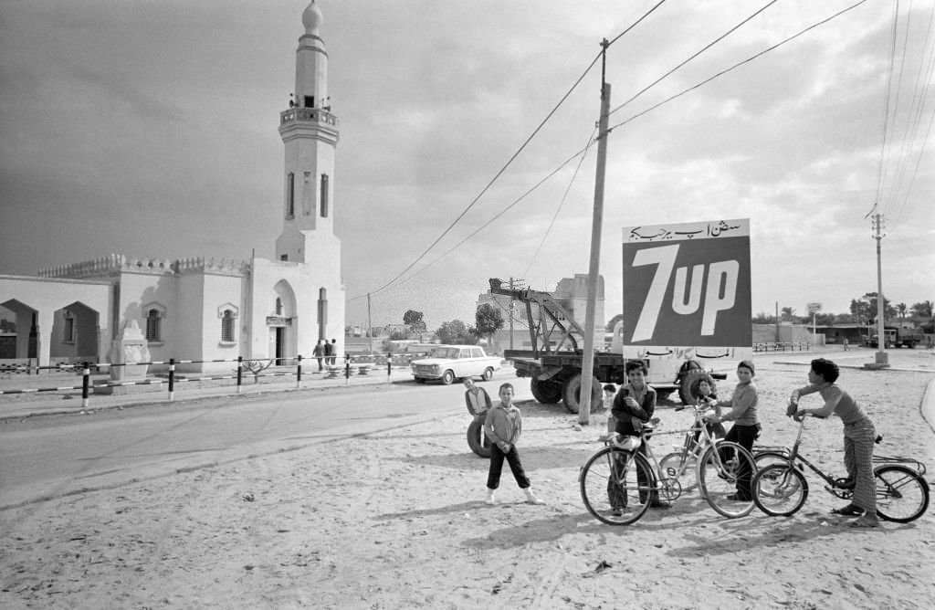 #123 Children in a street in El-Arich in North Sinai with a mosque in the background, 1978