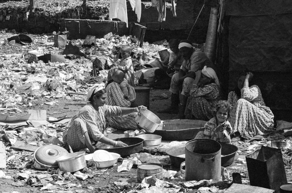 #131 Women and children in a slum on the outskirts of Cairo in October 1978, Egypt.