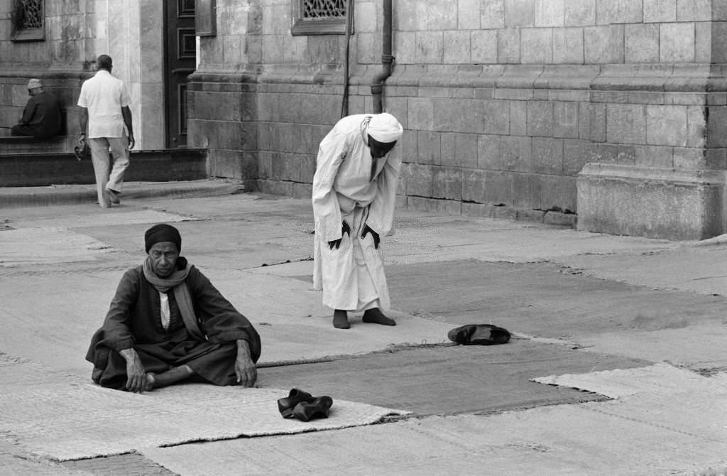 #133 People praying in a Cairo street in October 1978, Egypt.