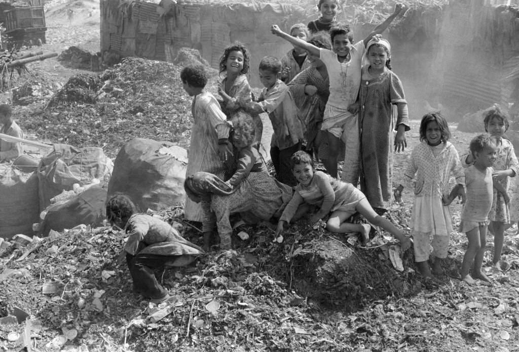 #142 Children at a garbage dump in a slum on the outskirts of Cairo, 1978