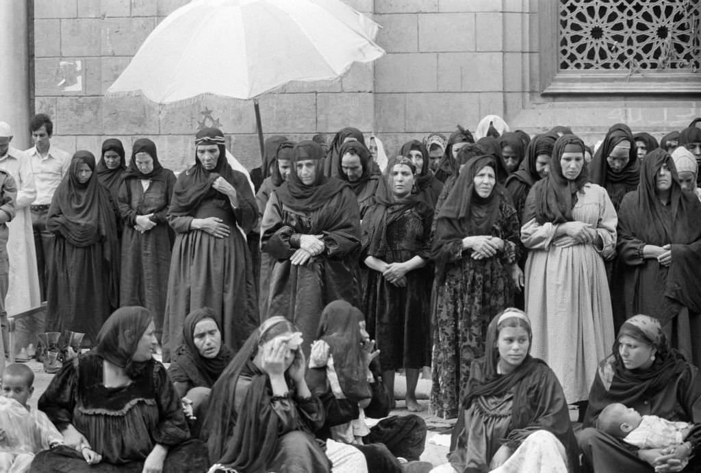 #145 Gathering of women for prayer in a Cairo street in October 1978