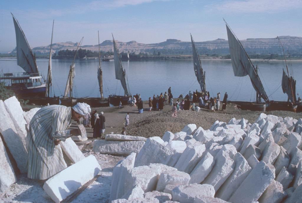 #167 A mason working by the Nile river bed, 1977