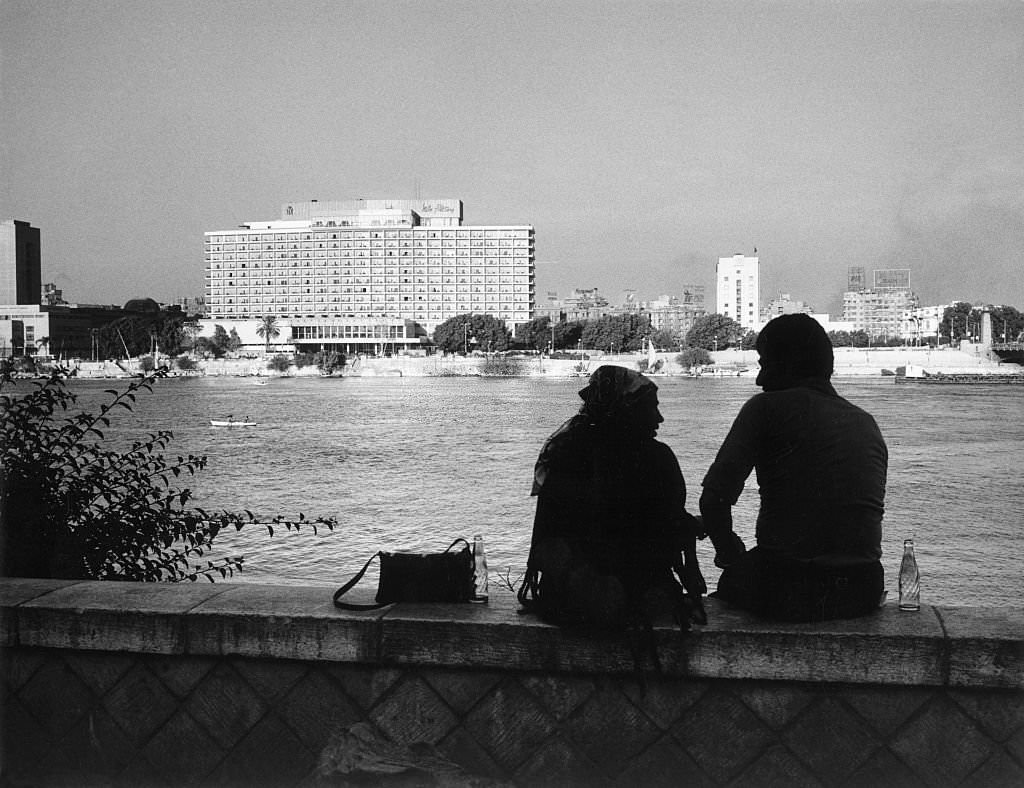 #171 Couple at the riverbank of the Nil, in background the Hilton hotel