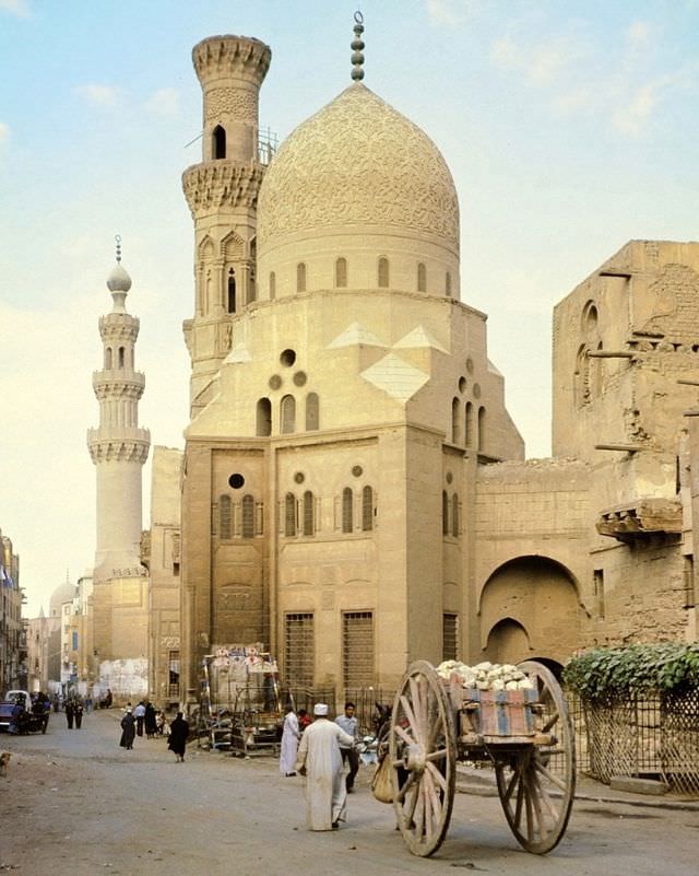 #222 Street scene with mosque and big-wheel donkey cart, Cairo, Egypt
