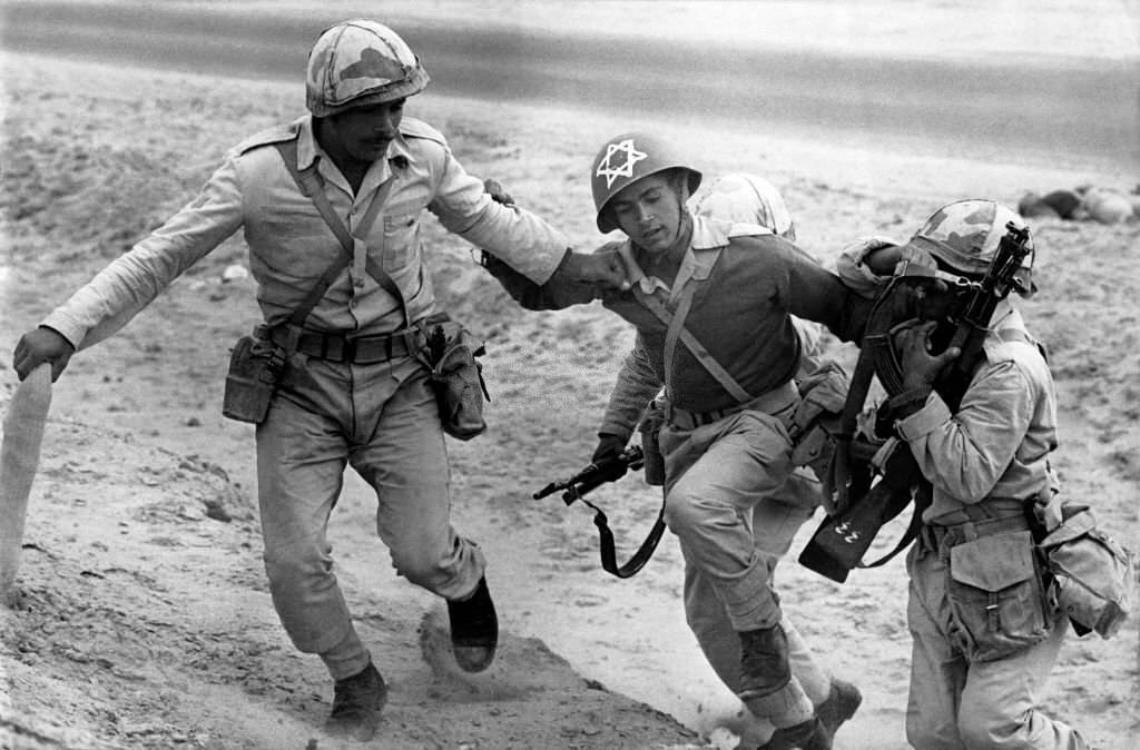 #32 An Egyptian plays the role of an Israeli prisoner during training in 1973.