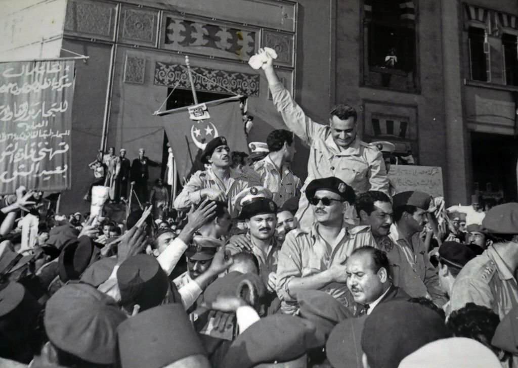 #62 Gamal Abdel Nasser and members of the RCC. welcomed by cheering crowds in Alexandria 1954.