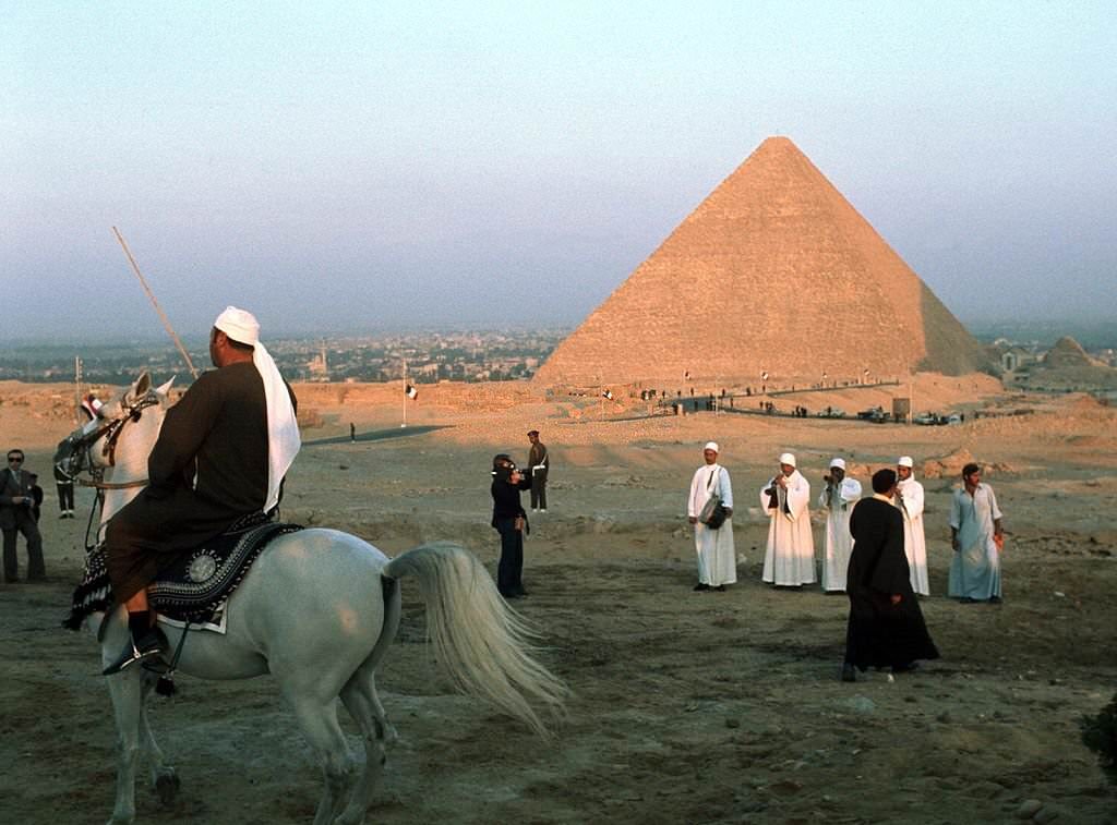 #70 A general view of a group of Egyptians near the Pyramid of Kheops, 1970s