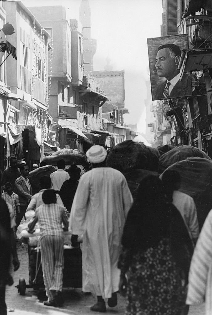 #73 View of pedestrians on a crowded street, Cairo, Egypt, 1970.