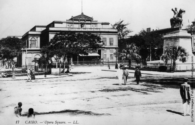 #254 Opera Square or Midan Opera in Cairo, with the opera house in the background and on the right, an equestrian statue of Ibrahim Pasha by Charles Cordier.