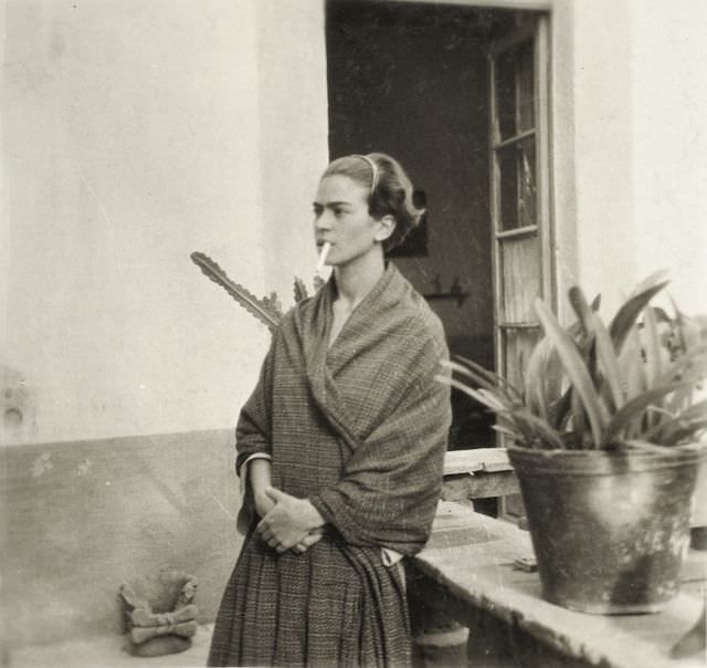 #1 Kahlo smoking at Casa Azul, 1930.