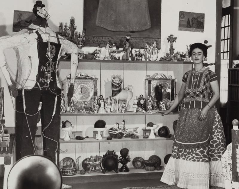 #2 Kahlo in Rivera Living Room with Figure of Judas, 1940.