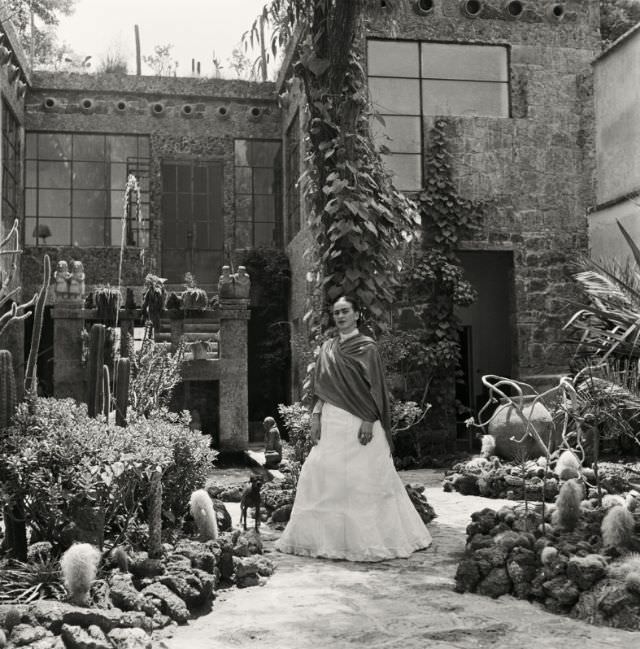 #21 Frida Kahlo in her garden, 1951.