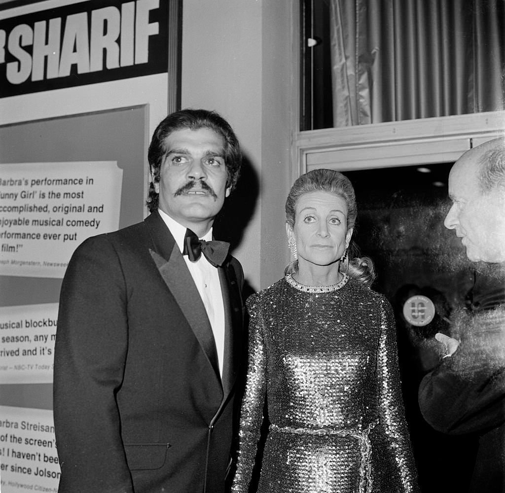Omar Sharif with Frances Brice-Stark (daughter of Fannie Brice and Nick Arnstein) attends the premiere of ‘Funny Girl’, 1968.