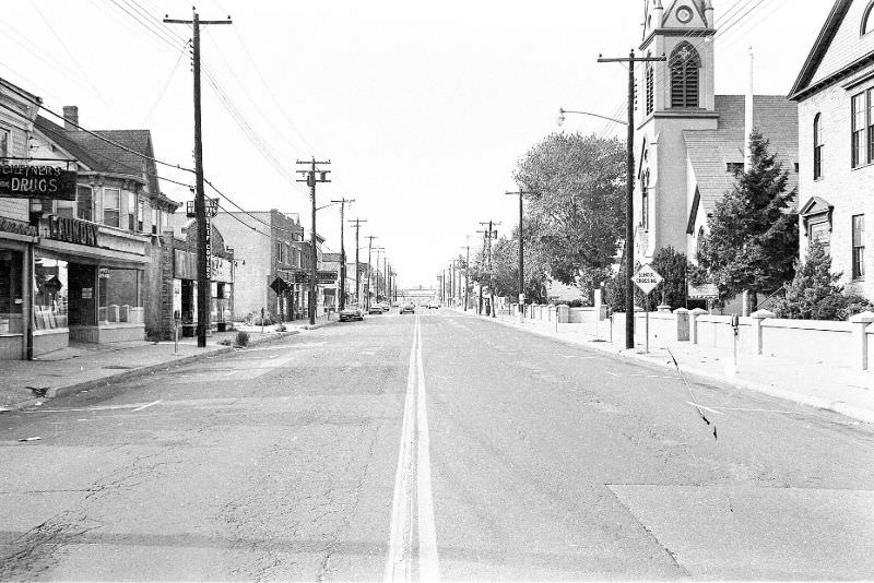 #3 Looking north on Broadway. Scheiner’s Drug store to the left, Hicksville, New York, 1967