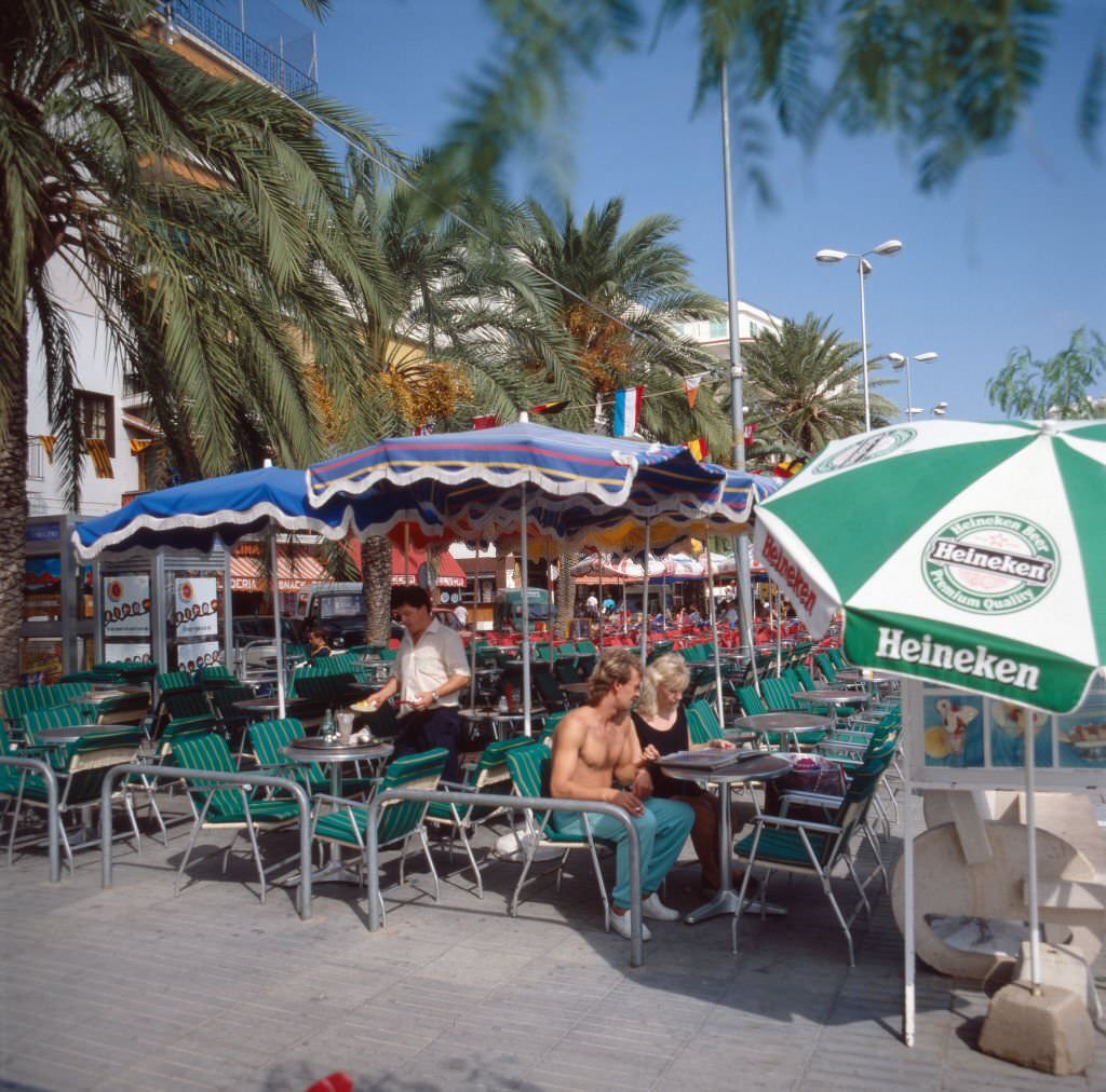 #18 A couple relaxing in a cafe of Sant Antoni de Portmany on the island of Ibiza, 1976