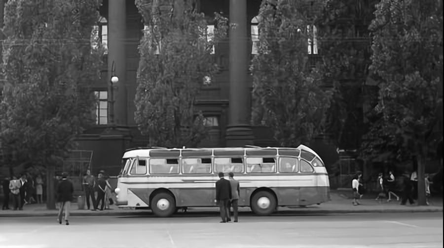 #37 People and a omnibus in Kyiv.
