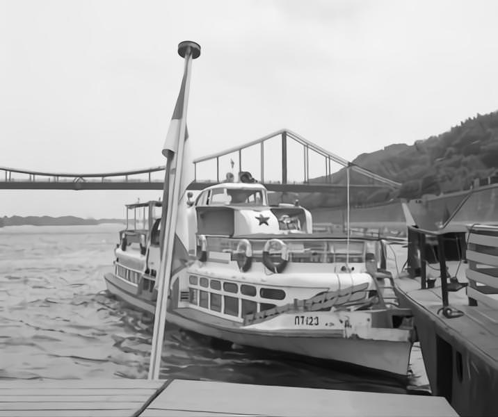 #53 Steamer at a landing stage at Dnieper River in Kyiv. In the back a bridge.