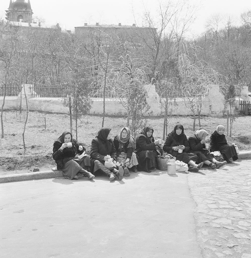 #61 Women workers enjoy their lunch break in a Kiev park, 1960