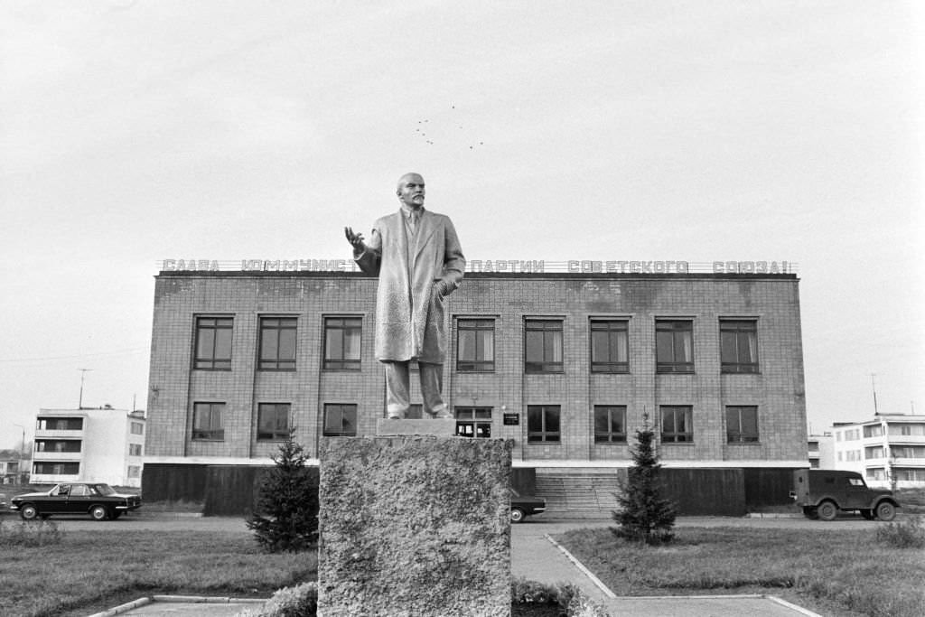 #24 A statue of Lenin in front of a building of the Soviet Communist Party in Kyiv, 1976