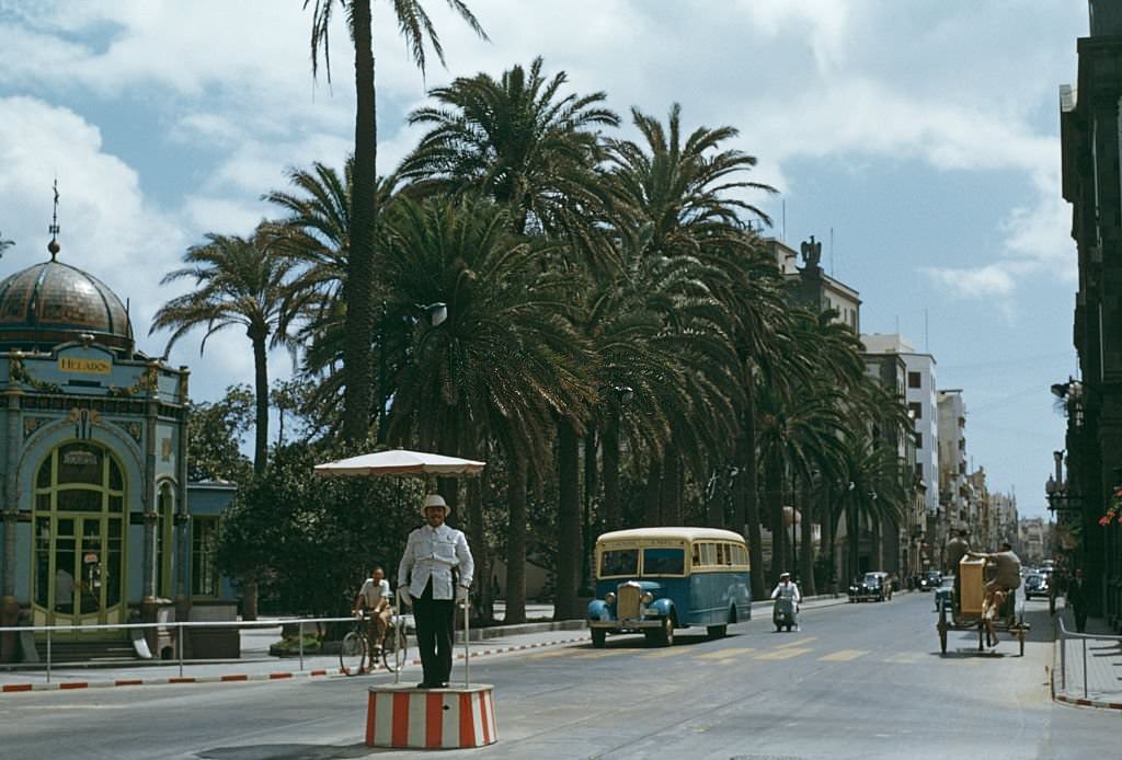 #40 A traffic policeman near the Parque San Telmo in Las Palmas, on Gran Canaria in the Canary Islands, 1955.