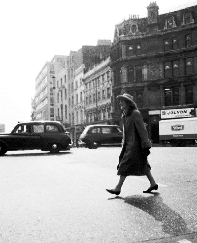 #29 Striding across Ludgate Circus in the spring sunshine, London, April 1973