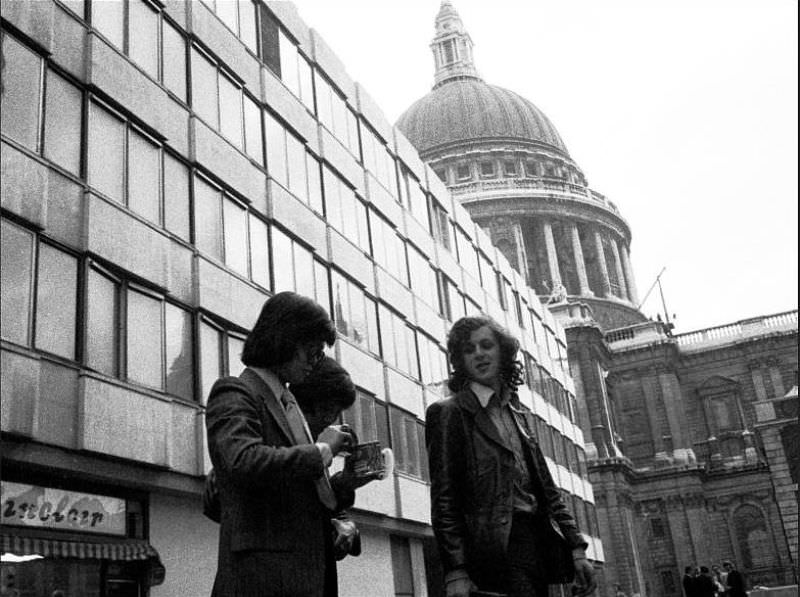 #31 Wrestling with a tin of peanuts in the shadow of St Paul’s Cathedral, Paternoster Square, London, April 1973
