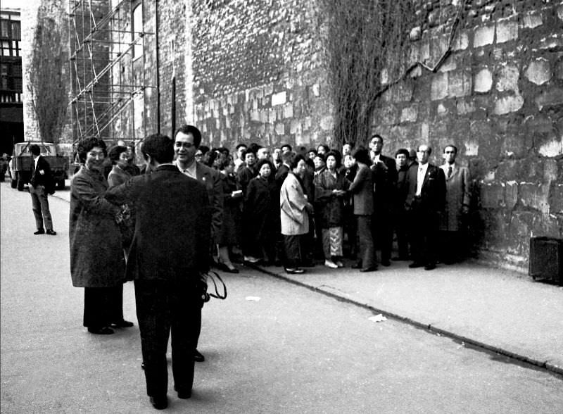 #4 Party of Japanese tourists waits for a late coach, London, 1972