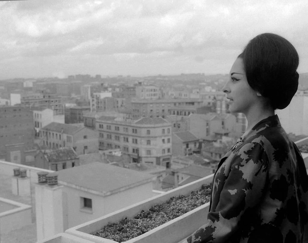 #31 Spanish dancer Lucero Tena on the balcony of her house, Madrid, Spain, 1964.