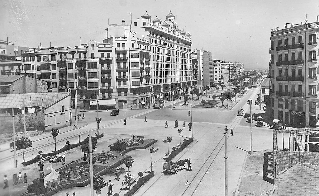 #8 The Gran Via in Valencia, a busy street with tall buildings, Valencia, Spain, 1960.