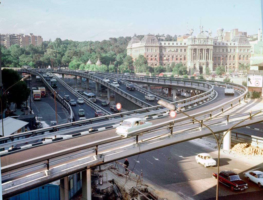 #78 Elevated view of a traffic overpass in the Plaza del Emperador Carlos V (also known as Plaza de Atocha), Madrid, Spain, 1965.