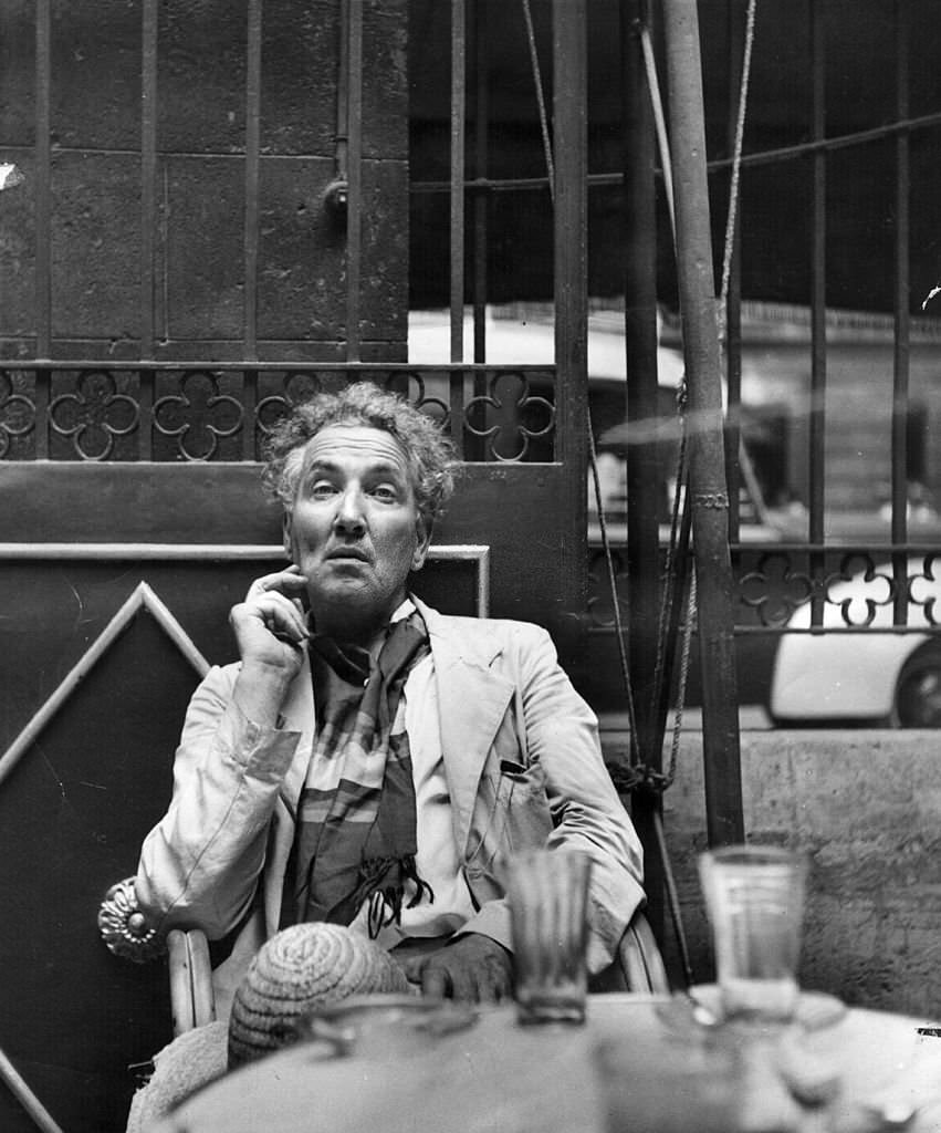 #119 Robert von Ranke Graves at a cafe in Palma de Majorca, 1954