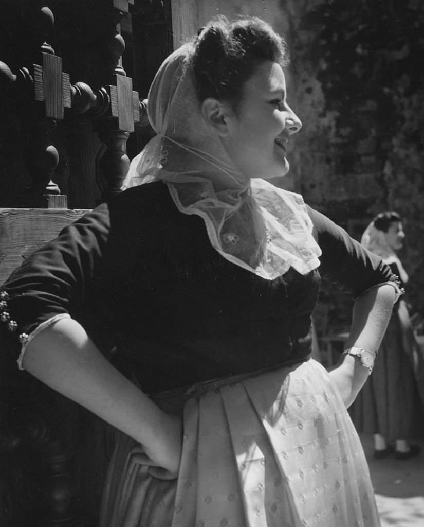 #134 A woman in national costume from Valledemosa in Majorca, 1950