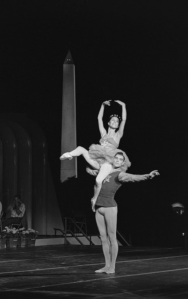 #21 Maria Tallchief and Jacques d’Amboise performing on the South Lawn of the White House tonight during a rehearsal for a program to follow the State Dinner for German Chancellor Ludwig Erhard tomorrow night.