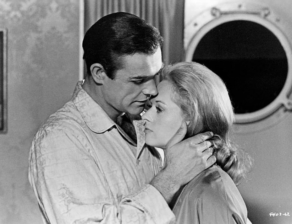 Diane Baker searching through private papers in a scene from the film ‘Marnie’, 1964.